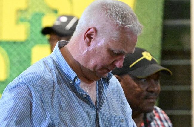 Flemming Berg was hurled with water by a supporter at Loftus Stadium.